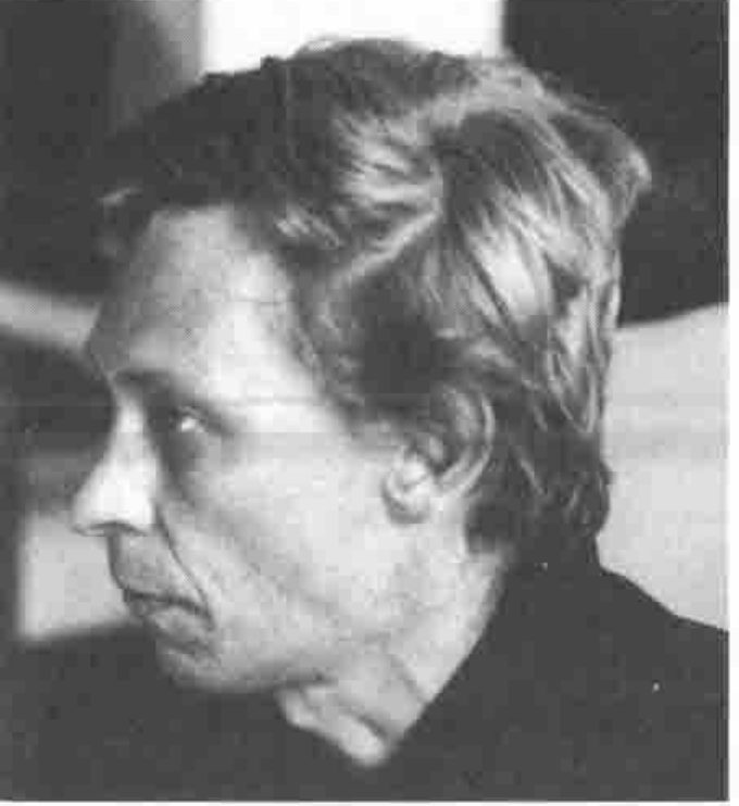 Profile of a man with swept-back hair