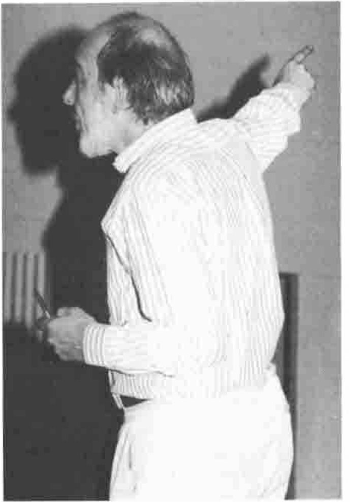 Gérard Langlet, pointing upwards as he lectures