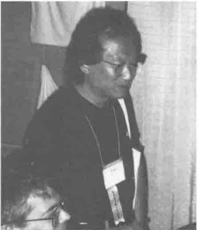 Roger Hui, with Chris Burke in the foreground