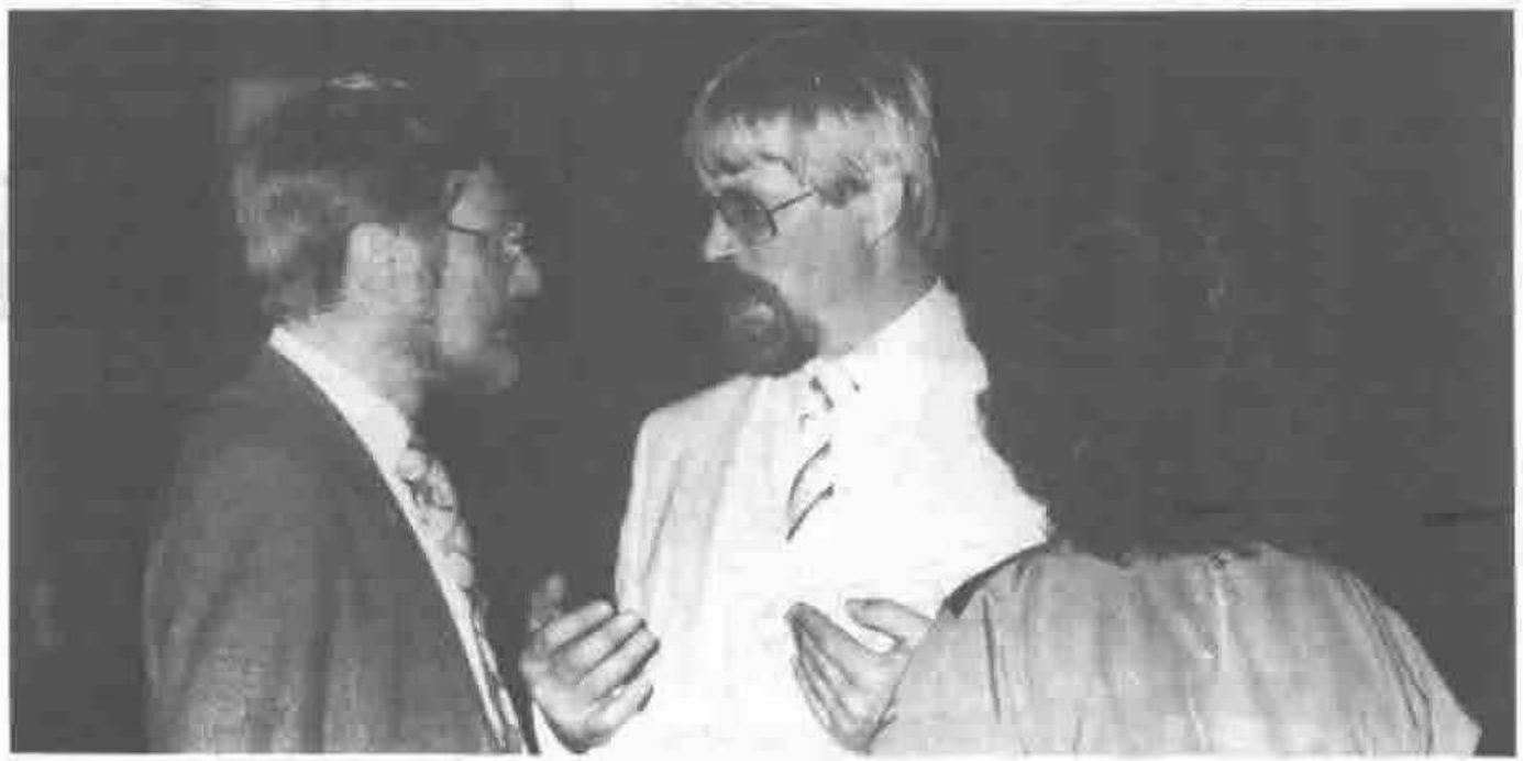 Timo Seppala, the conference chairman, deep in conversation
