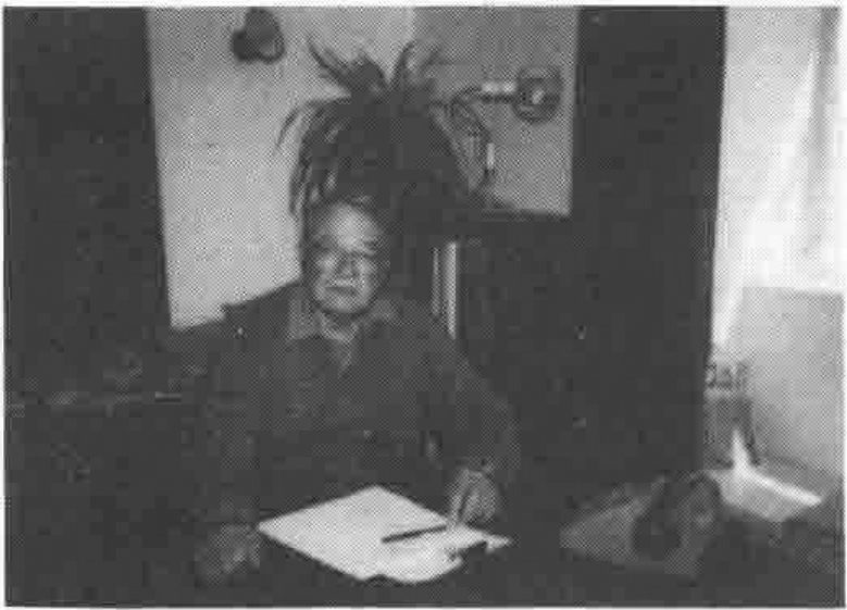 Photograph of Dick Gray at a desk