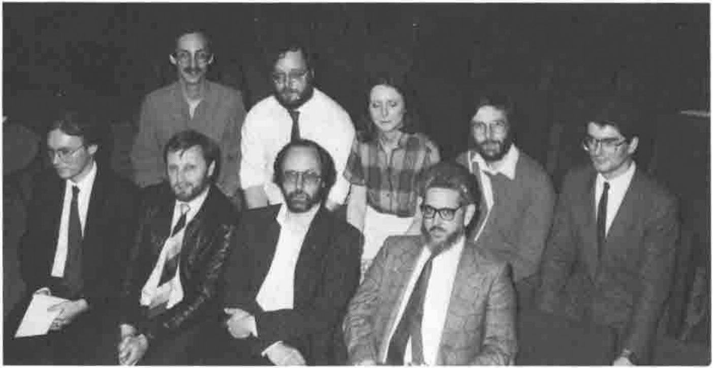 Photograph of nine members of the new committee, in two rows