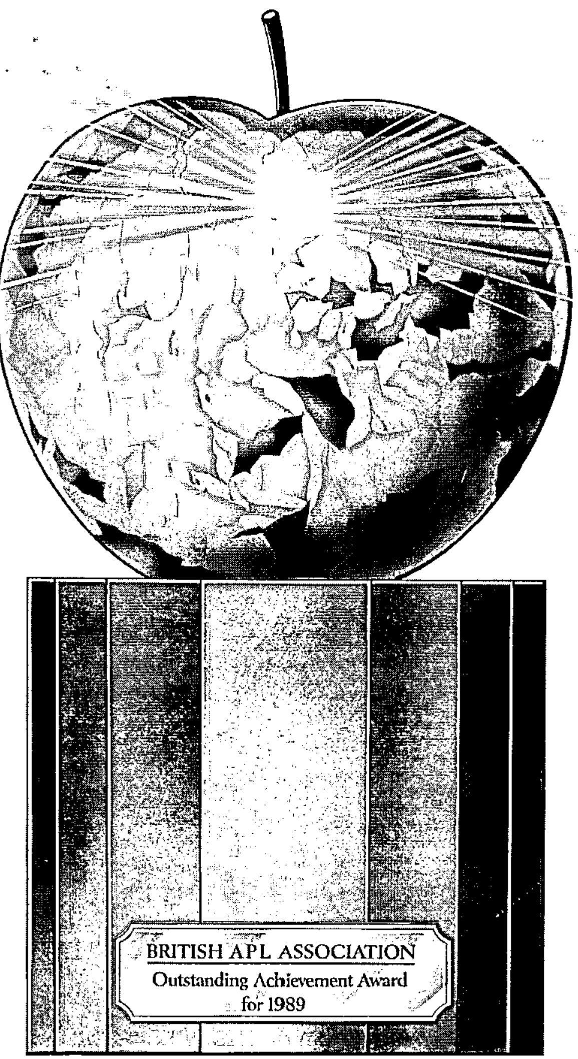 The award: an apple-shaped globe on a striped plinth, with a plaque reading “British APL Association — Outstanding Achievement Award for 1989”
